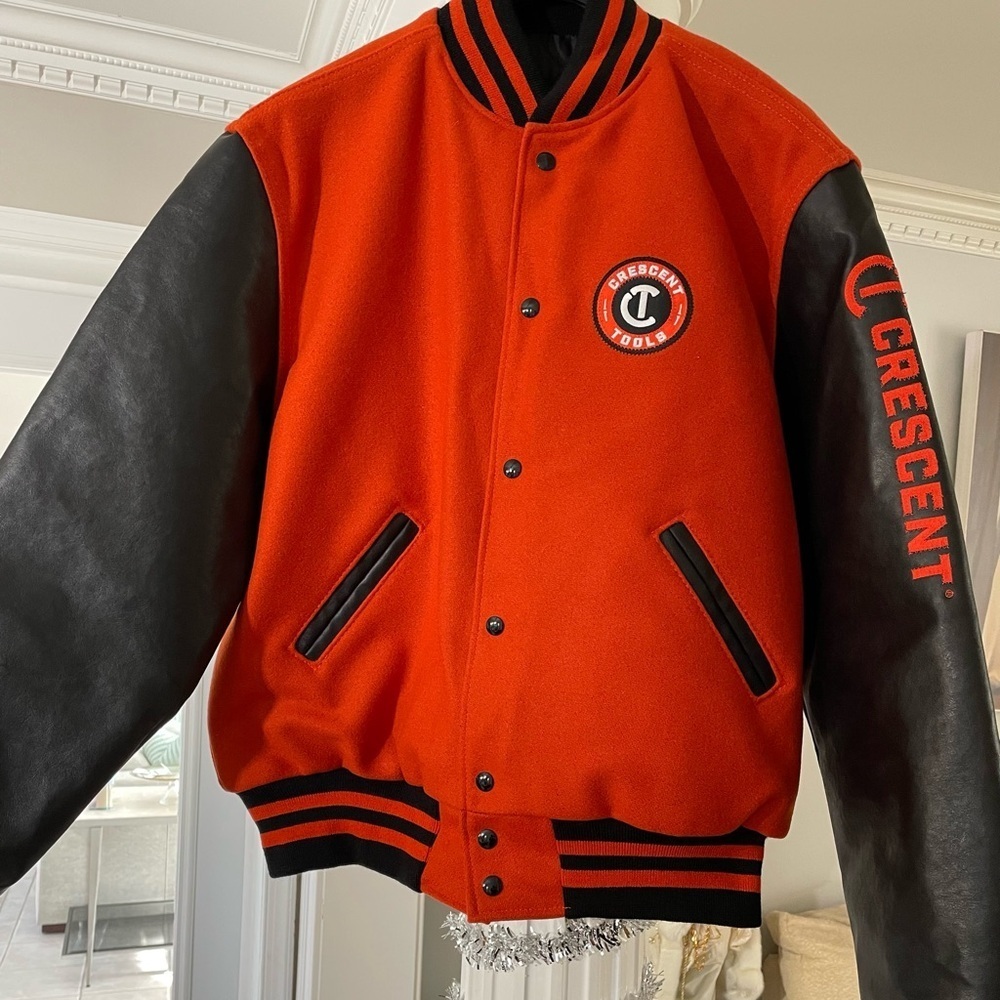 Halloway men’s the original Varsity Jacket size large black and orange.